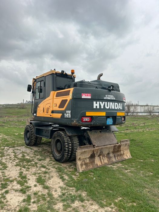 Экскаватор колесный Hyundai 145