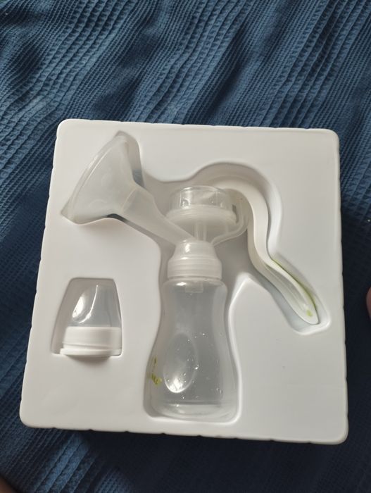 Молокоотсос, не пользовались,новый