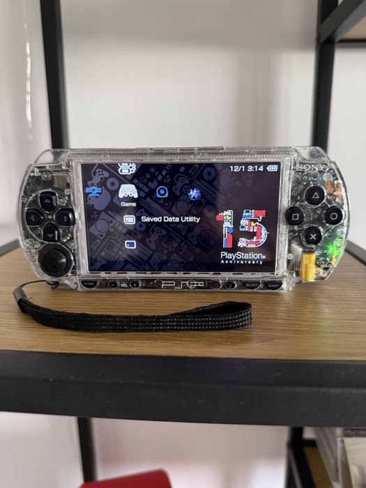 PSP 1000 modat ARK-4 display IPS– peste 200 de jocuri incluse