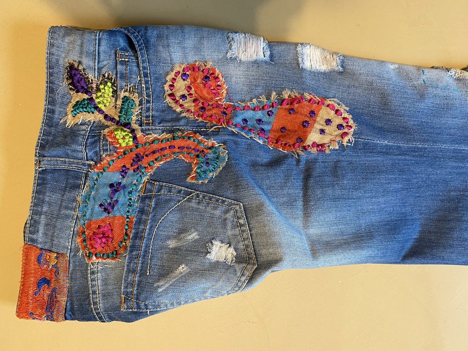 Blugi evazati “Desigual” -dama-