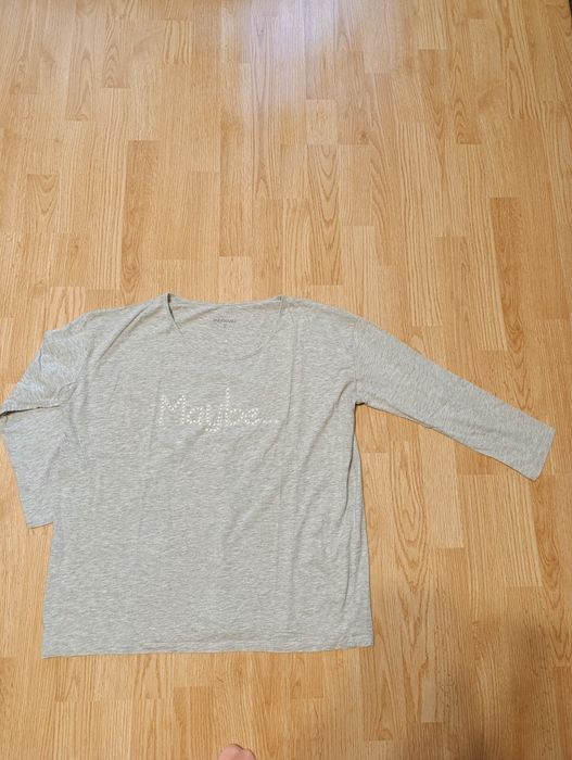 Maybe... doriți o bluză din bumbac cu mărgeluțe?