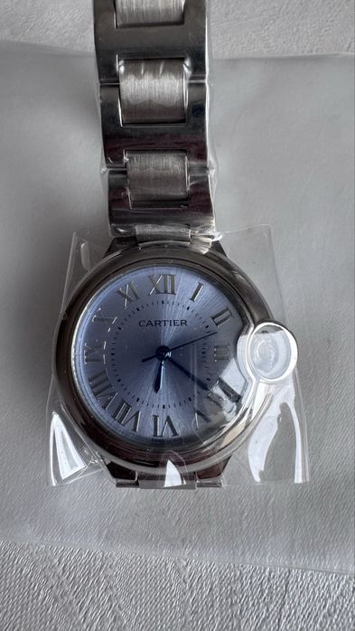 Женские часы Cartier, Rolex