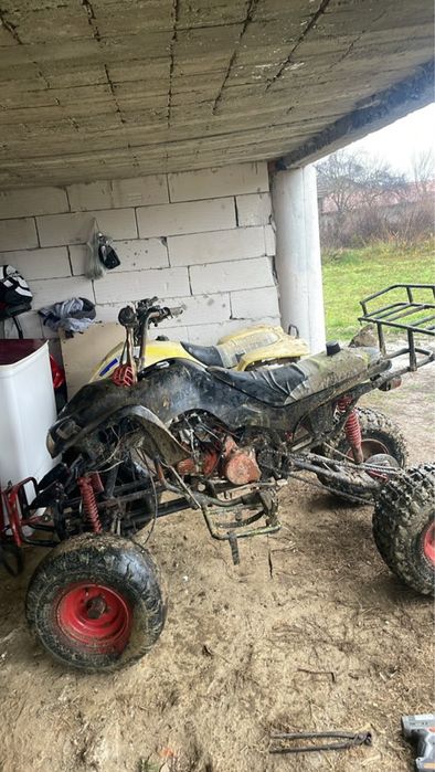 Vand un atv de 125cc