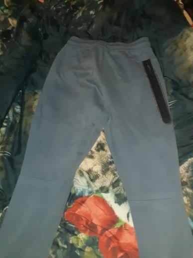 Pantaloni Nike tech albaștri
