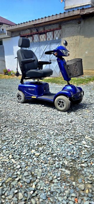 Scuter Carut electric INVANCARE pentru persoane cu dizabilități sau mobilitate redusa