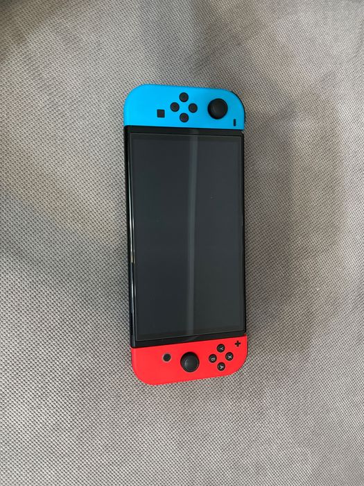 Nitendo switch oled în stare bună.