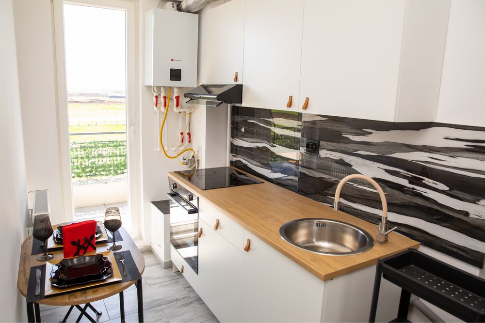 Garsoniera moderna -prima inchiriere langa Luxury Motors