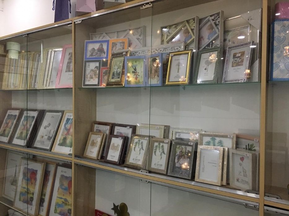 Фоторамки и фотоальбомы