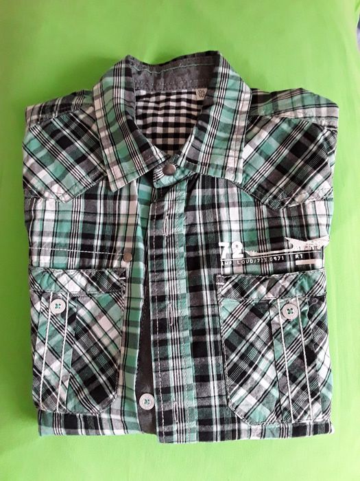 Риза 134-140 см.