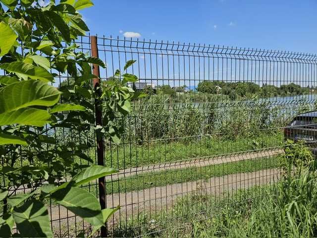 Teren de vanzare pe malul lacului in Stefanestii de Jos
