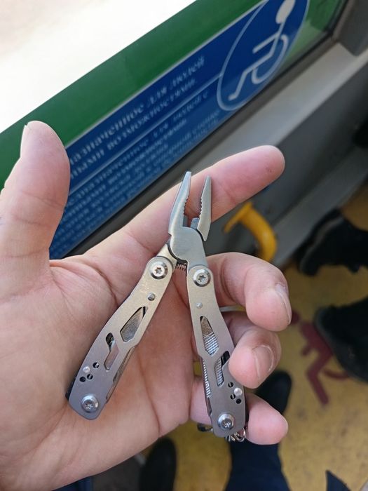 Мультитул новый     .