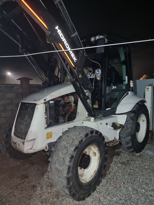 Аренда экскаватор погрузчик.три в одном