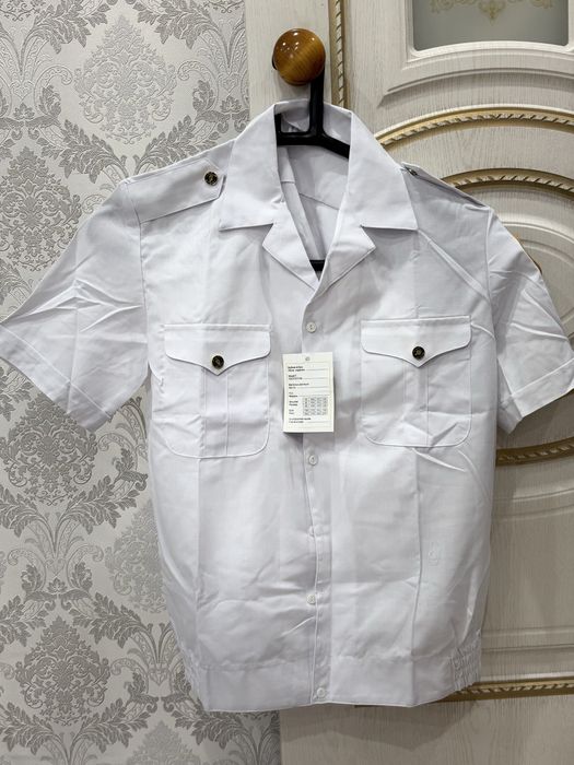 Форменная рубашка KMG Security и кепка