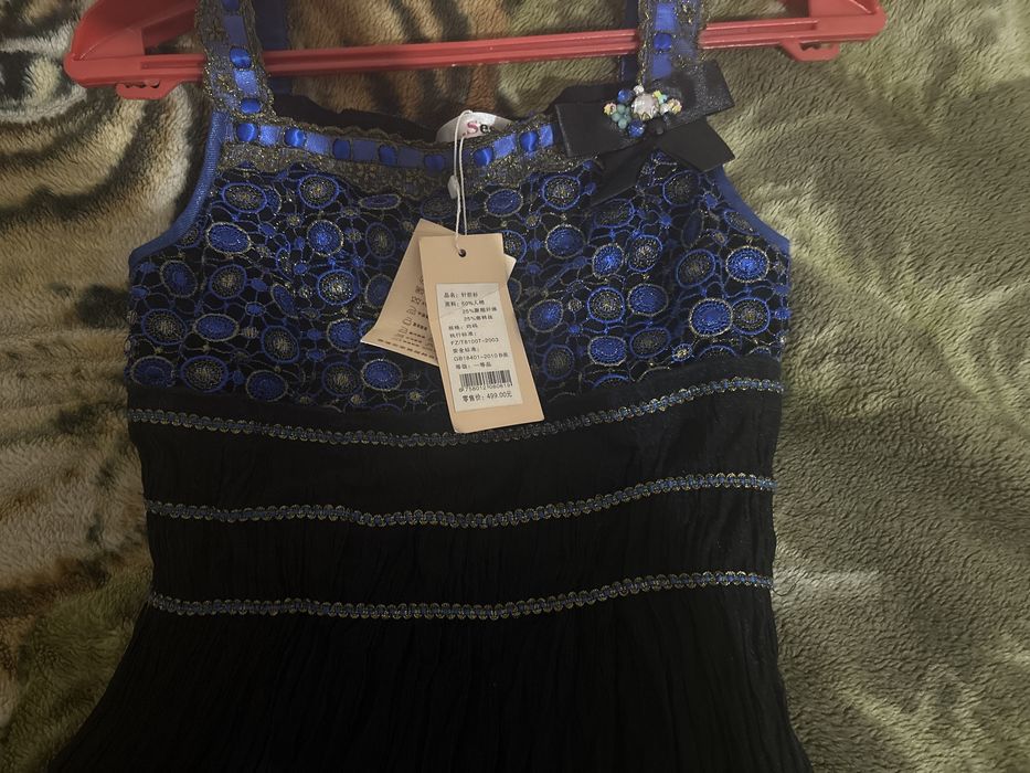 Новое платье этикетка стоит