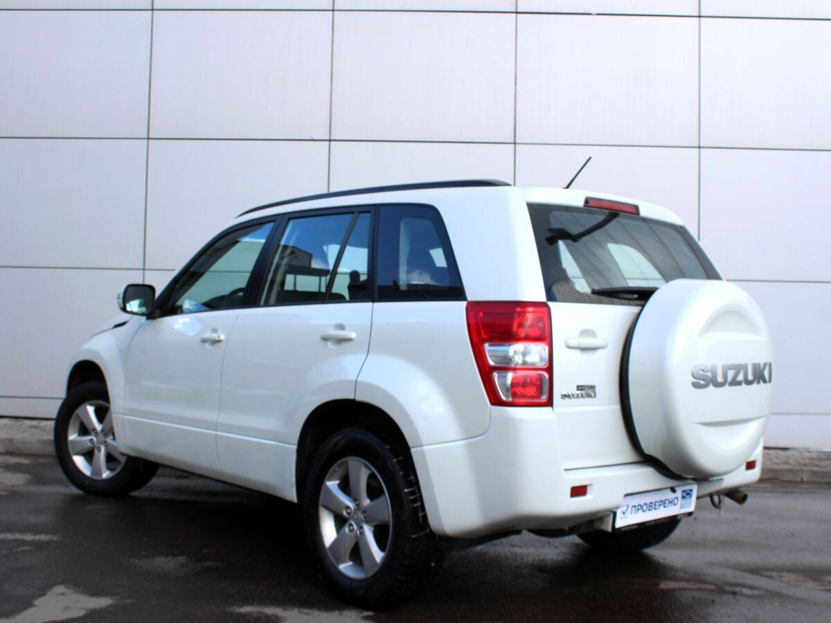 Р–С‘Р»С‚С‹Р№ Suzuki Grand Vitara