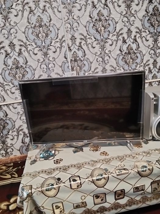 Центр ва телевизор артел32 сотилади