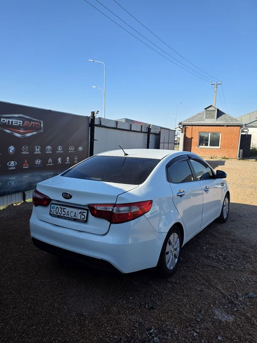 Kia Rio 2013 год