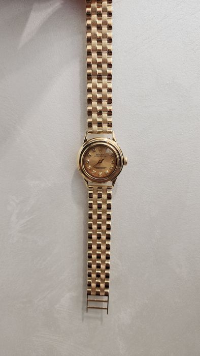 Женские золотые часы Rolex