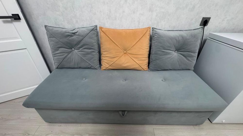 Продам раскладной диван-кровать в сером цвете, в хорошем состоянии.