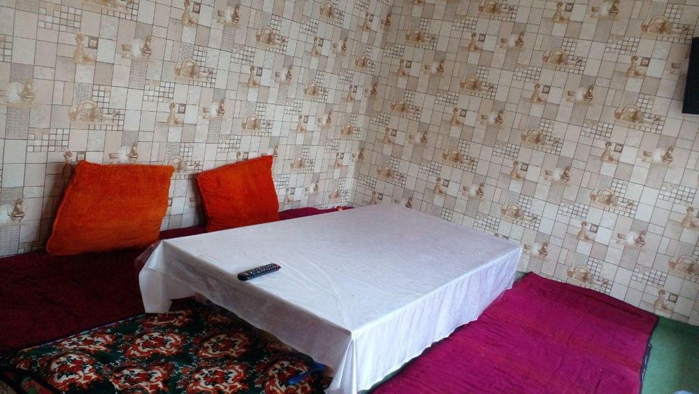 130,000$Ховли уй  сотилади бобур калхозда йўл бойида 8сотх  9 хона