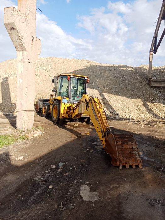 Услуги экскаватора погрузчика