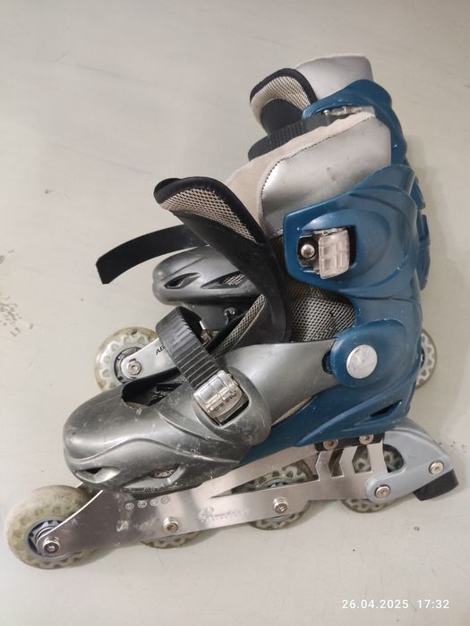 Роликовые коньки