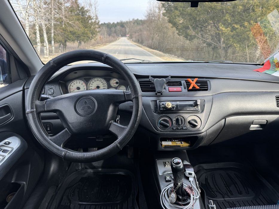 Mitsubishi Lancer 1.6 98кс газ