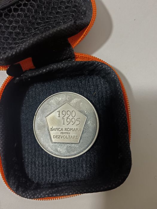 19 monede de argint. 1400 lei