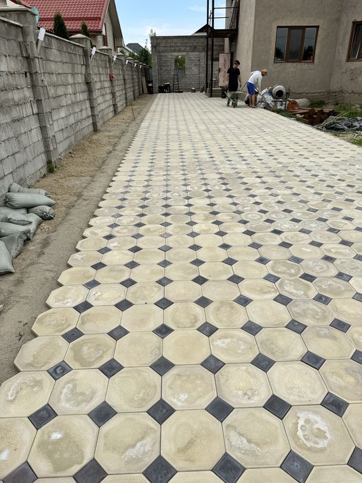 Укладка тротуарной плитки (брусчатки)