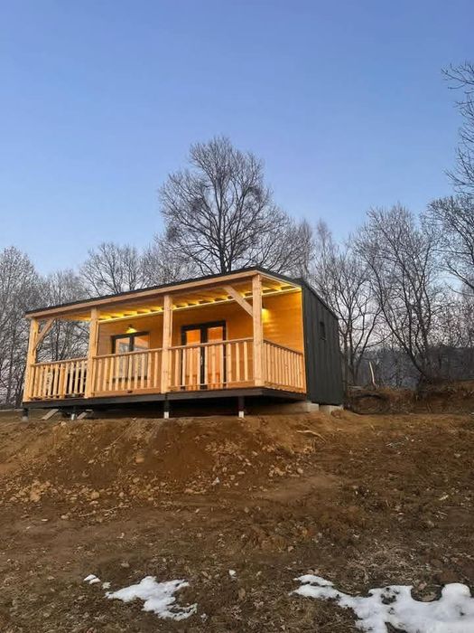 Case și căsuțe de lemn de locuit permanent și vacanță