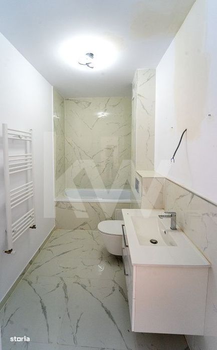 Apartament 3  camere - finisat la cheie, intabulat
