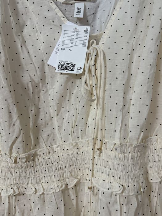Bluza cu peplum si mâneci bufante