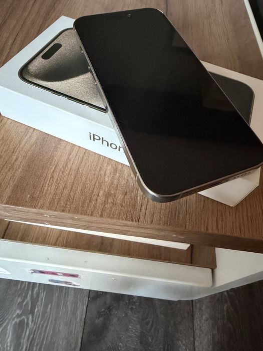 iPhone 15 pro natural titanium 128gb
