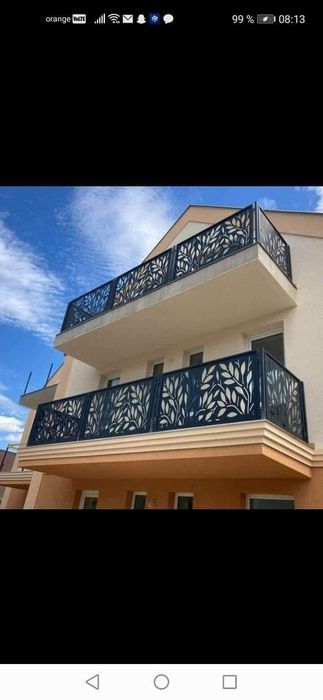 Placări cu panouri Sandwich, montaje uși de garaj și industriale