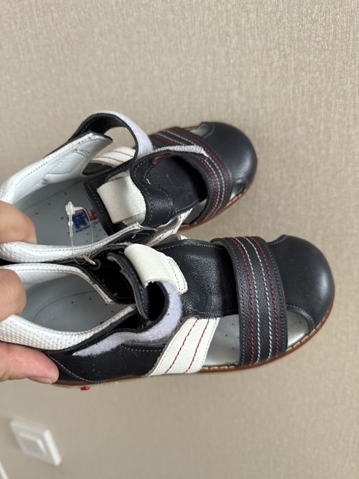 Продам сандали новые кожа