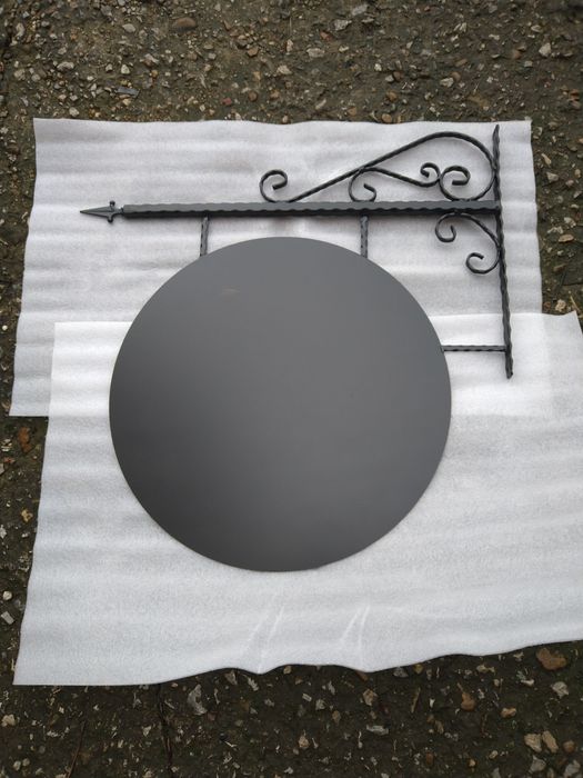 Рекламна табела от ковано желязо