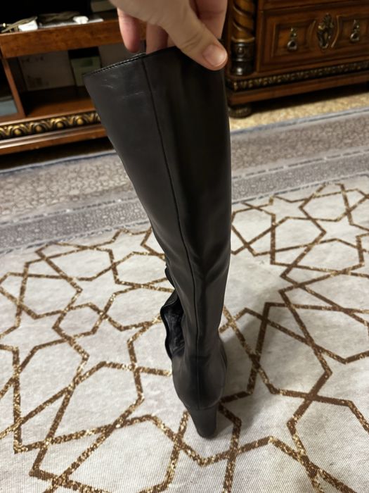 Продам женскте сапоги