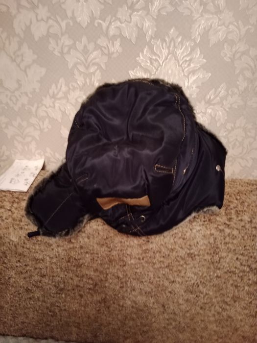 Шапки. Ушанки. Новые