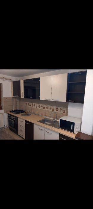 Apartament 2 camere de inchiriat etaj 2 din 4 cu centrala si mobilat