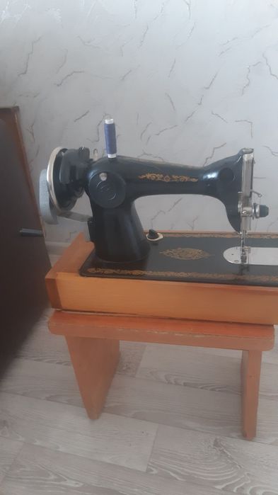 Швейная машина .