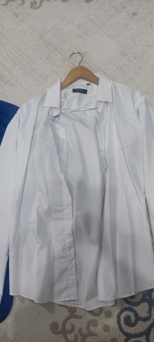 Продам костюм с брюками и рубашкой