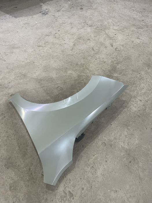 Skoda rapid крыло левое