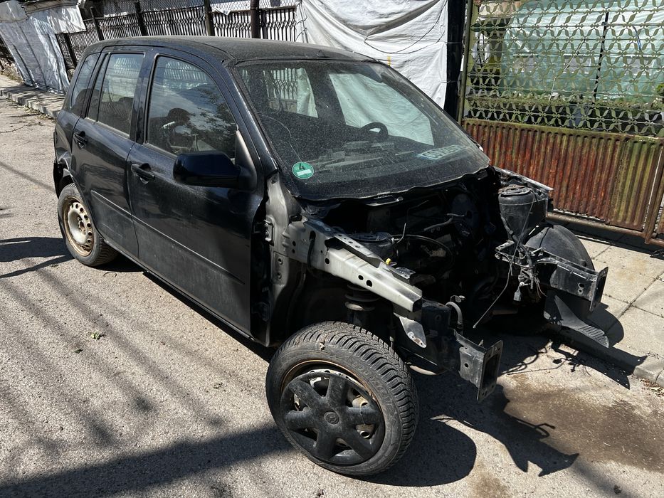 Mazda 2 на части