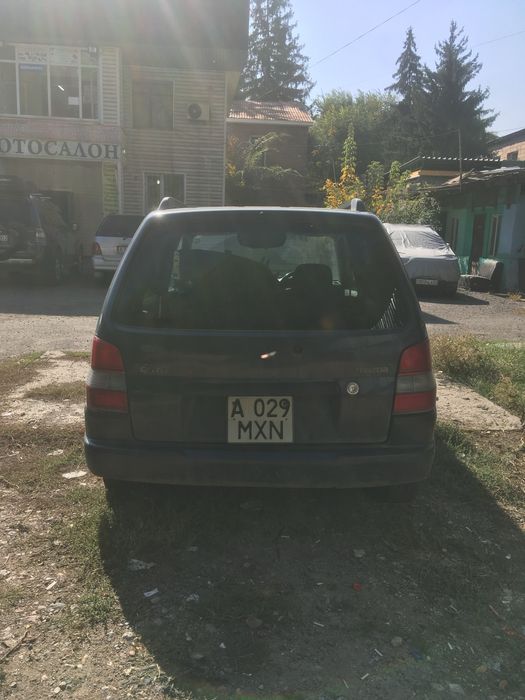 Мазда Демио