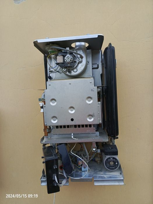 Ремонт, промывка от накипи и переделка 2х контурных котлов.