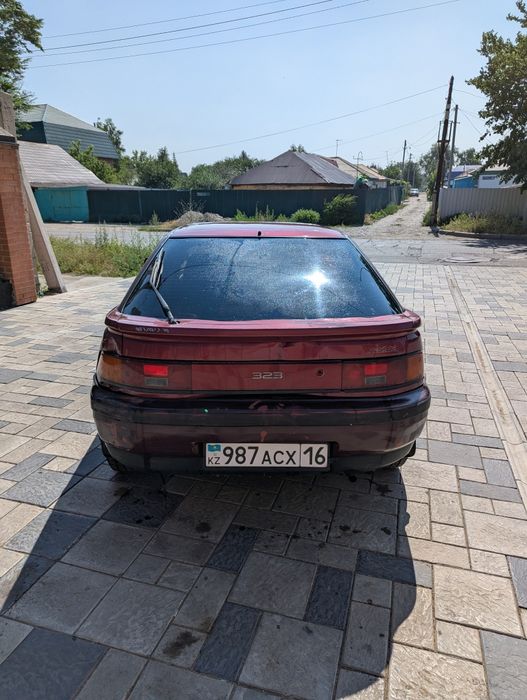 Mazda 323f bg слепая в отс