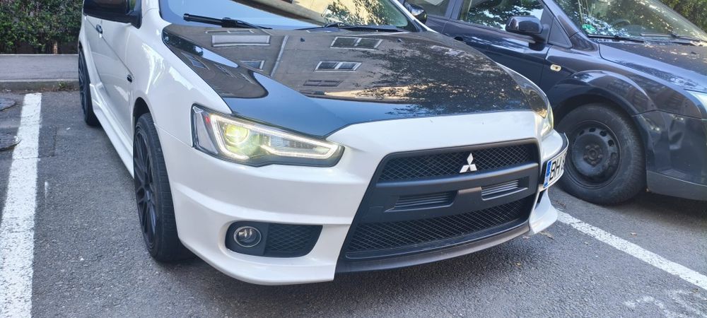 Mitsubishi Lancer X – EVO Style – 1.6 Benzină, 2011 – Alb/Negru – O bi