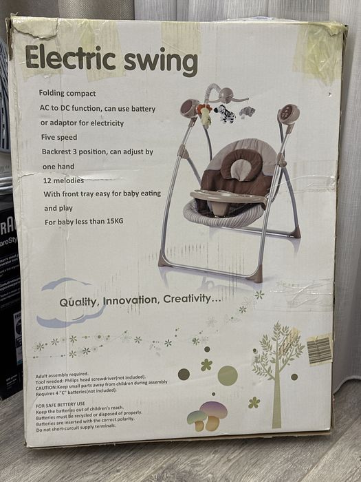 Детские качели автоматические