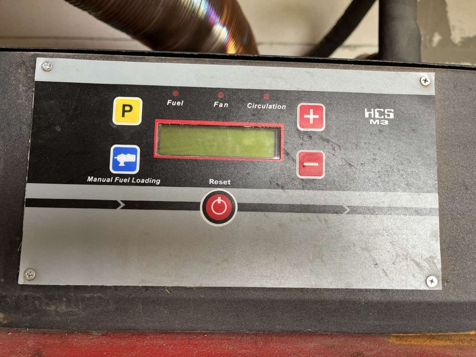 Комбиниран котел за пелети и дърва