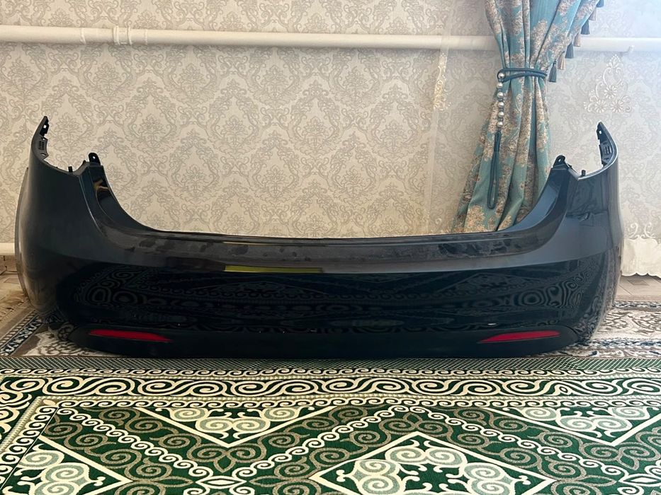 Задний бампер Kia Rio